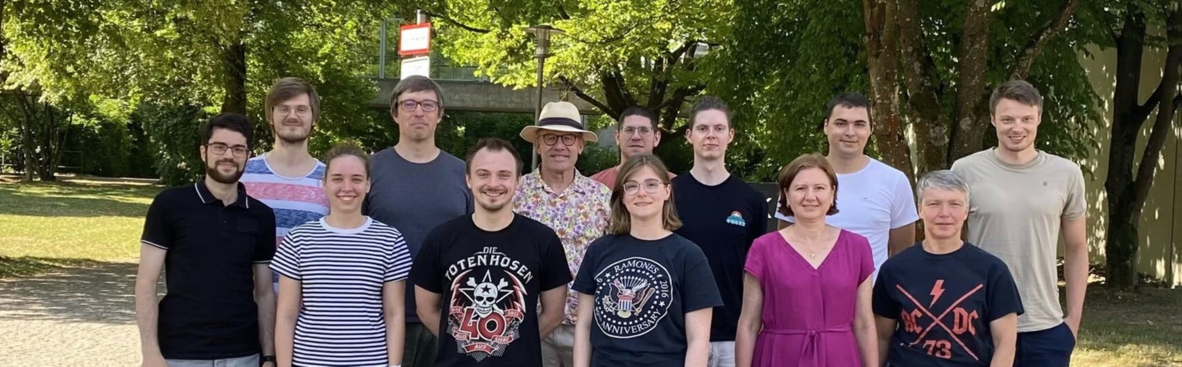 Prof. Franz Giessibl (center, wearing a hat) with his research team